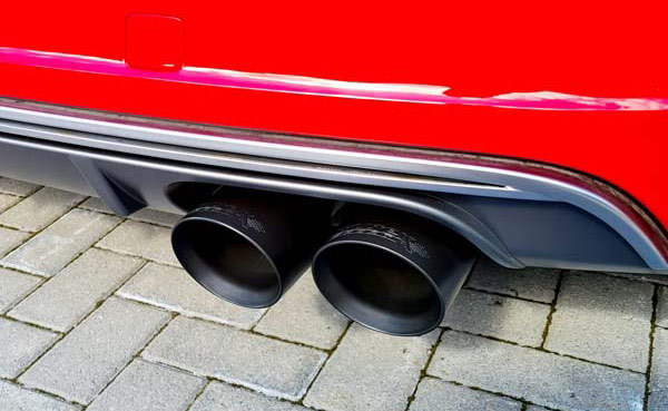 Under car view of a high performance exhaust kit fitted to a car